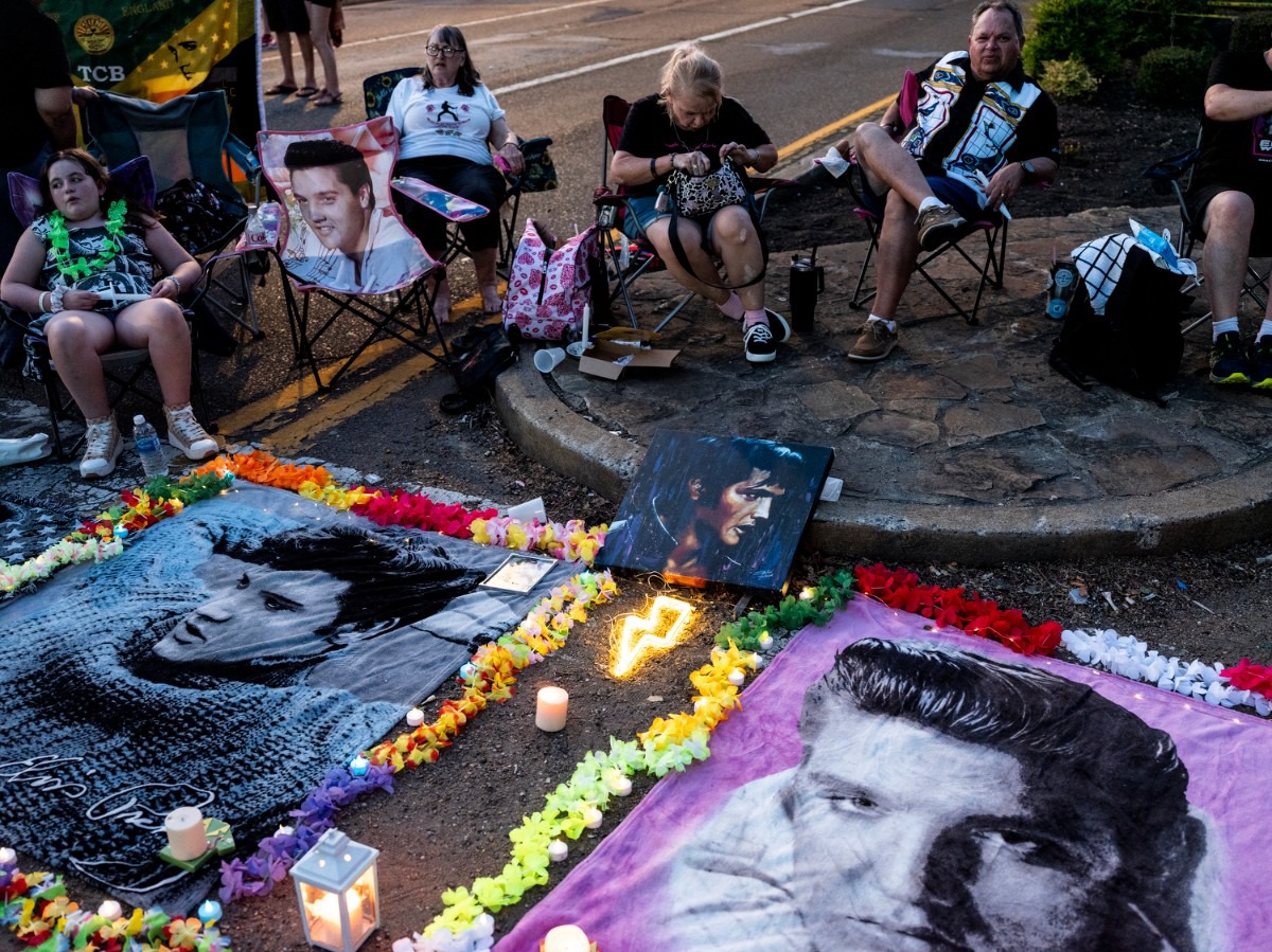 <strong>Fans bring a variety of Elvis images to the vigil, on folding chairs, beach towels, record covers, blankets and more.&nbsp;</strong>(Brad Vest/Special to The Daily Memphian)