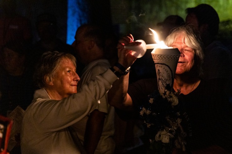 <strong>Year after year, fans pass the flame of remembrance from candle to candle, heart to heart, at the Candleight VIgil.&nbsp;</strong>(Brad Vest/Special to The Daily Memphian)