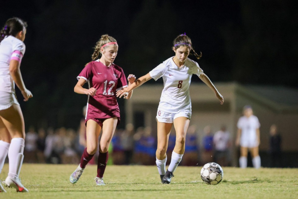 <strong>ECS&rsquo; Allie Broadway (12) battles St. George&rsquo;s Sarah Kilmurray (8) for the ball at the West Region Semifinal game at St. George&rsquo;s on Oct. 11, 2022.</strong> (Ryan Beatty/Special to the Daily Memphian file)