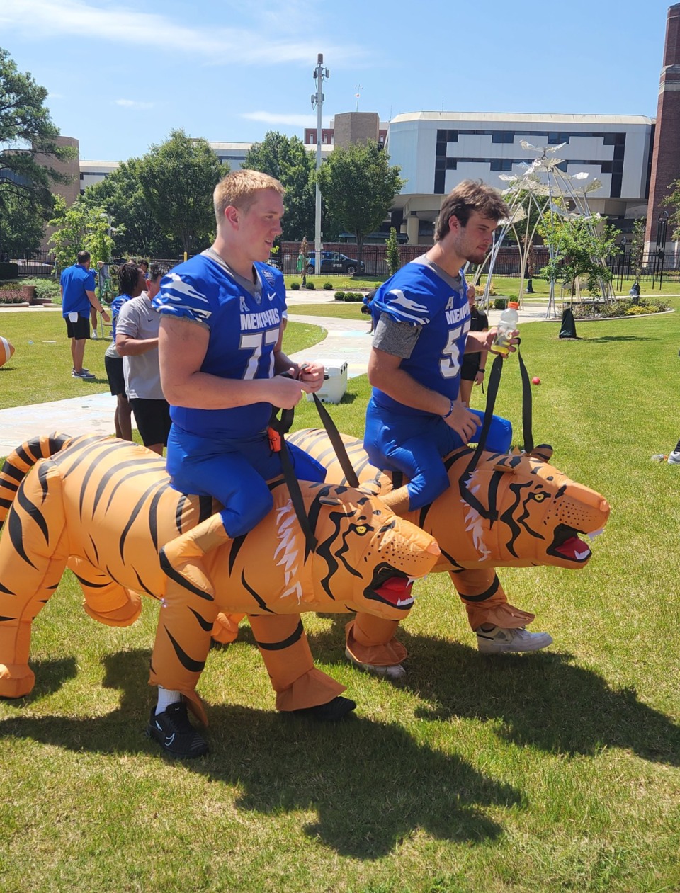 <strong>University of Memphis offensive linemen Parker Peterson (left) and Jacob Gray are among the players who came out Friday for a tailgating party at Le Bonheur Children&rsquo;s Hospital.</strong> (Frank Bonner/The Daily Memphian)