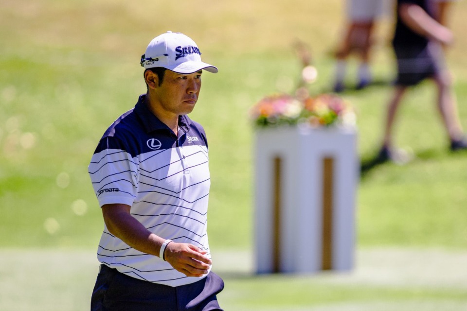 <strong>Hideki Matsuyama walks to his ball after hitting a drive off the first tee during Saturday&rsquo;s third round of the FedEx St. Jude Championship.</strong> (Benjamin Naylor/The Daily Memphian)