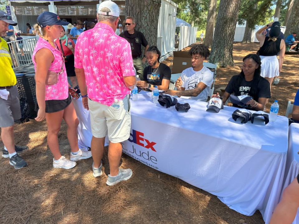 <strong>University of Memphis athletes greet fans Saturday, Aug. 17, 2024 at FedEx St. Jude Championship at TPC Southwind.</strong> (Parth Upadhyaya/The Daily Memphian)