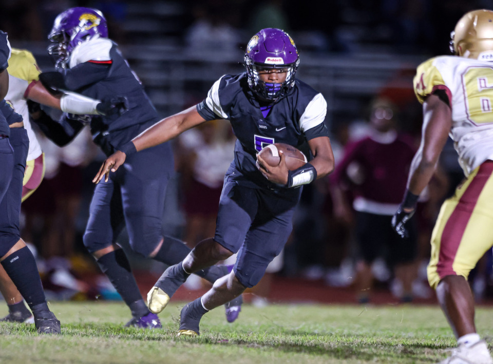 <strong>Southwind&rsquo;s Kelvin Perkins (5) scrambles from the pocket during the Melrose High School and Southwind High School football game, on Thursday, Sept. 21, 2023. Southwind defeated Melrose 34-6.</strong> (Wes Hale/Special to The Daily Memphian file)