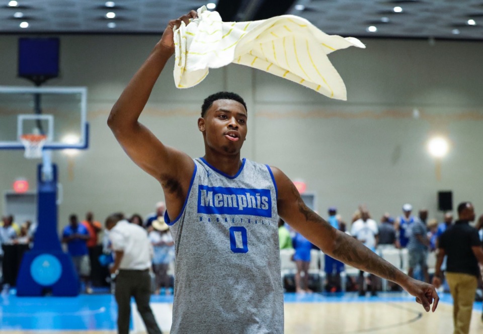 <strong>Memphis Tigers forward DJ Jeffries celebrates after 114-83 victory over the Commonwealth Bank Giants in their exhibition game Wednesday. Jeffries finished with a team high of 21 points on 8-of-13 shooting.</strong> (Mark Weber/Daily Memphian).