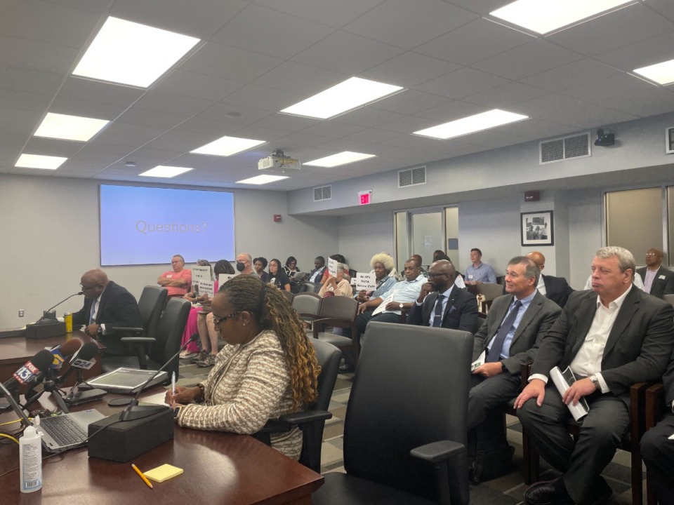 <strong>Memphis Area Transit Authority Interim CEO Bacarra Mauldin faces the Memphis City Council on Tuesday, Aug. 20. Local activists hold signs urging there be no cuts to the transit system as it faces financial difficulties</strong>. (Samuel Hardiman/The Daily Memphian)