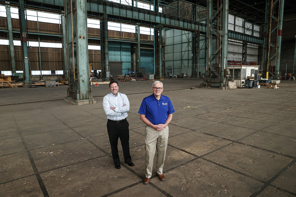 <strong>Matt Brantz (left), director of the Memphis detachment of the Naval Surface Warfare Center, Carderock division, and University of Memphis professor Eddie Jacobs will soon open a drone testing facility on Presidents Island.</strong> (Mark Weber/The Daily Memphian)