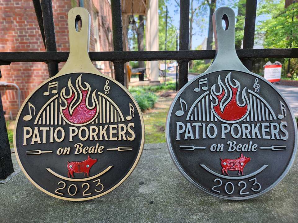 <strong>Patio Porkers on Beale hosted their first barbecue cooking contest in May 2023 in Handy Park on Beale Street. The Metal Museum of Memphis hand-crafted the trophies for the 2023 Patio Porkers on Beale barbecue cooking contest.</strong>&nbsp;(Courtesy Patio Porkers on Beale)