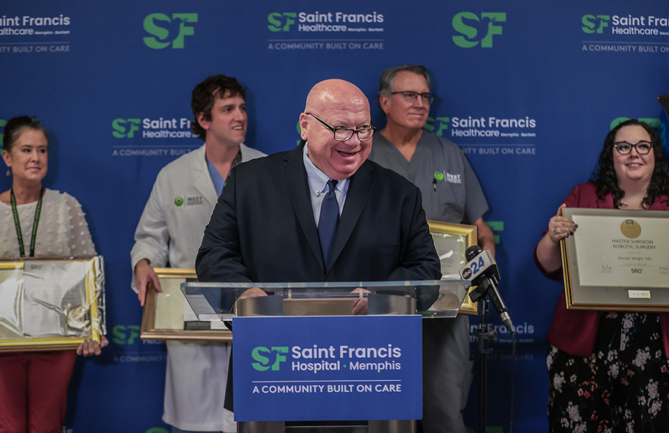 <strong>St. Francis Healthcare CEO Scott Smith speaks at a Aug. 21, 2024 press conference. Smith is flanked by members of the surgical robotics team.</strong> (Patrick Lantrip/The Daily Memphian)