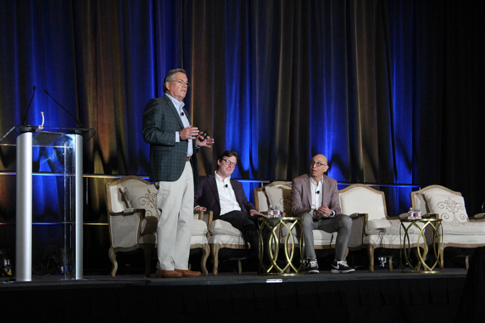 <strong>From left to right: Moderator Mark Woodworth with Woodworth &amp; Associates, Will Webster (research manager for CBRE Hotels) and Isaac Collazo (vice president of analytics at STR, subsidiary of CoStar Group) speak at the industry trends and forecast talk.</strong> (Sophia Surrett/The Daily Memphian)