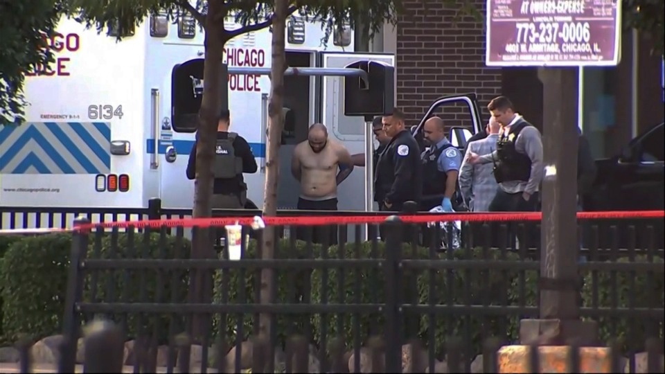 <strong>Joshua Zimmerman is taken into custody following a standoff with police at a restaurant in Chicago on Wednesday, Aug. 21, 2024.</strong> (ABC 7 Chicago via AP)