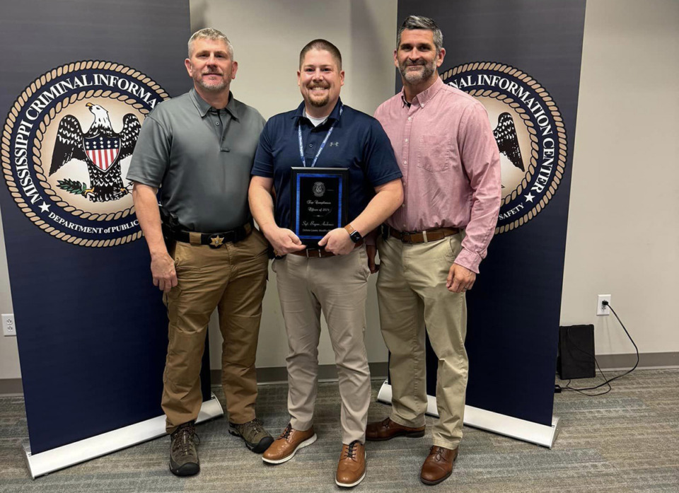 <strong>Left to right: Lt. Jeff Logan, Sgt. Bryan Andrews and Capt. Jeremy Dodson after Andrews was recognized for his work.</strong> (Courtesy DeSoto County Sheriff's Office)