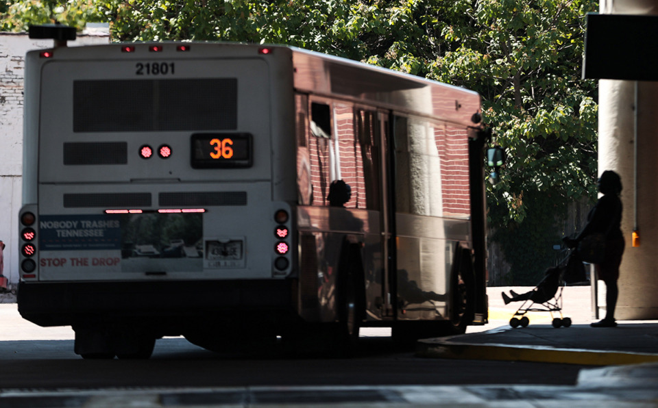 <strong>A woman and her child wait to ride a MATA bus at the William Hudson Transit Center Aug. 21.</strong> (Patrick Lantrip/The Daily Memphian)