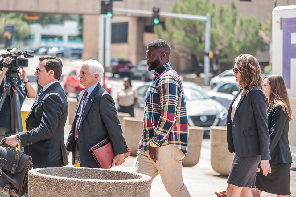 <strong>Flanked by his attorneys, former Memphis Police Department officer Emmitt Martin walks into the Odell Horton Federal Building Aug. 23.</strong> (Patrick Lantrip/The Daily Memphian)