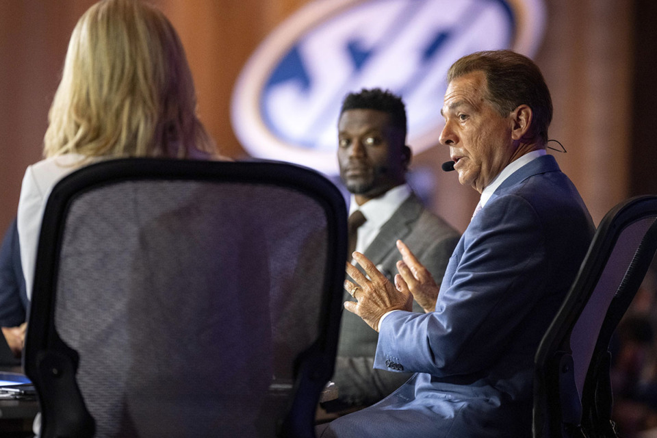 <strong>ESPN sportscaster and former football coach Nick Saban speaks during the Southeastern Conference NCAA college football media days July 15 in Dallas.</strong> (Jeffrey McWhorter/AP file)