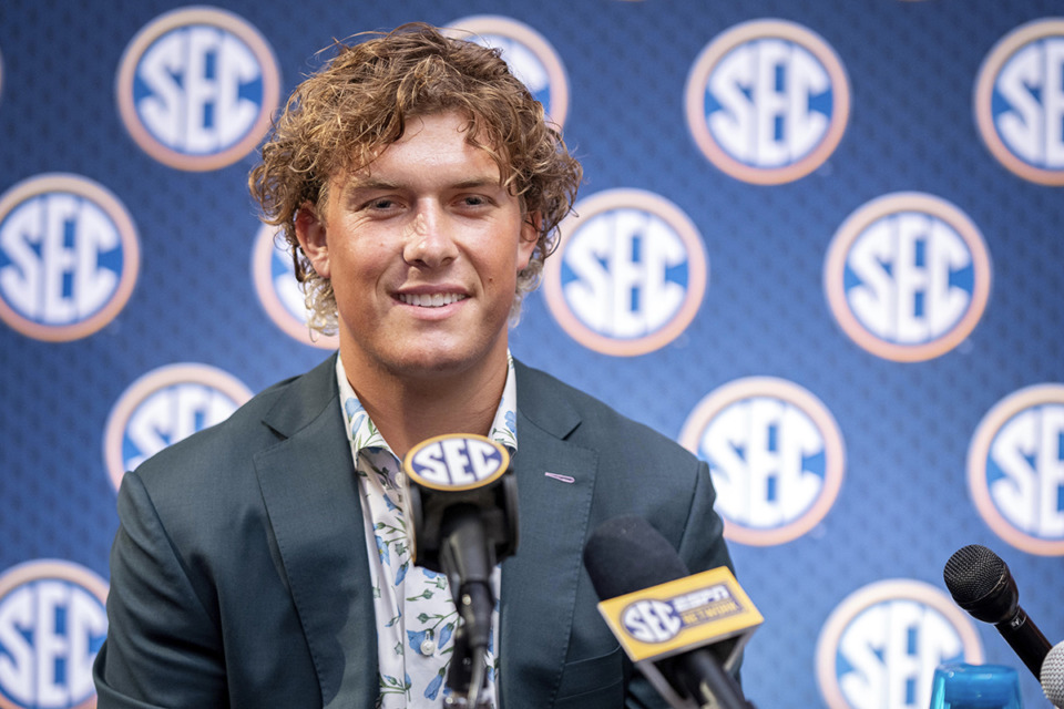 <strong>Mississippi quarterback Jaxson Dart speaks during the Southeastern Conference NCAA college football media days July 15 in Dallas.</strong> (Jeffrey McWhorter/AP file)