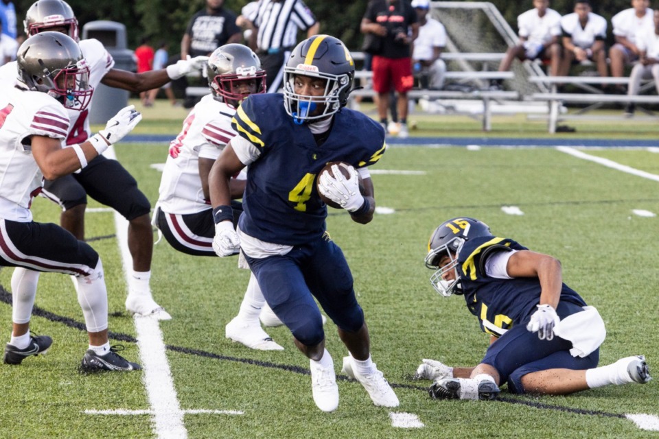 <strong>Lausanne&rsquo;s Marterius Boyd runs with the ball during Friday's high school football game of the week between MASE and Lausanne at Lausanne.</strong> (Brad Vest/Special to The Daily Memphian)