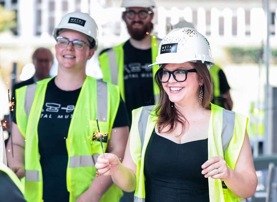 <strong>Metal Museum supporters and employees walk with sparklers at the conclusion of a groundbreaking ceremony for the Metal Museum's new home in the former Memphis College of Art building Aug. 29.</strong> (Patrick Lantrip/The Daily Memphian)