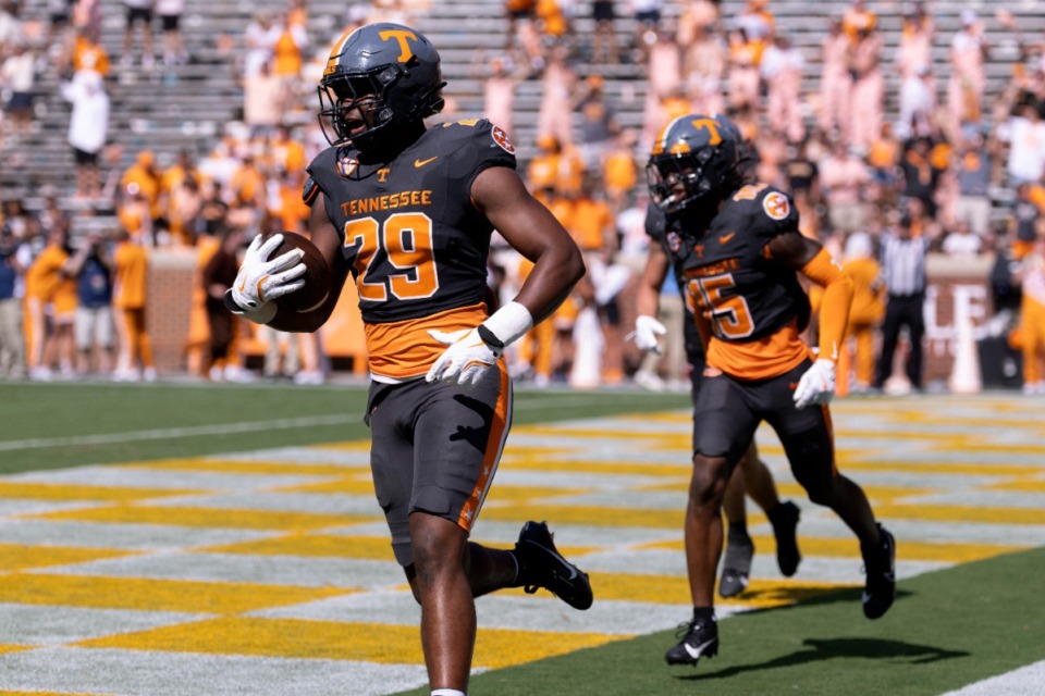 <strong>Tennessee defensive lineman Jordan Ross (29) returns a blocked punt for a touchdown during the second half of an NCAA college football game against Chattanooga, Saturday, Aug. 31, 2024, in Knoxville</strong>. (Wade Payne/AP)