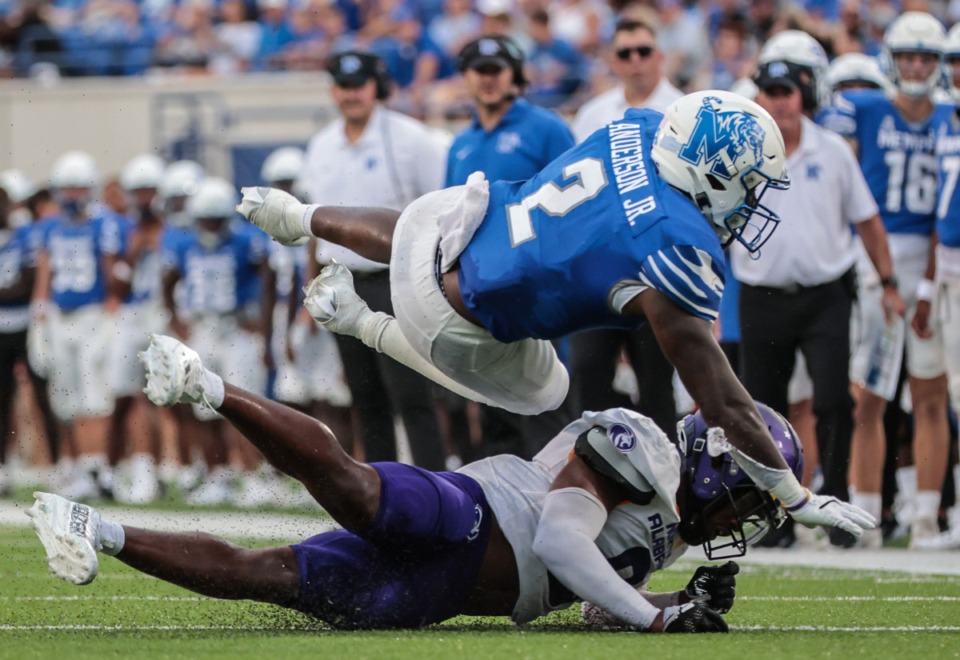 <strong>Memphis running back Mario Anderson (2) takes a hard hit during Saturday&rsquo;s win North Alabama.</strong> (Patrick Lantrip/The Daily Memphian)