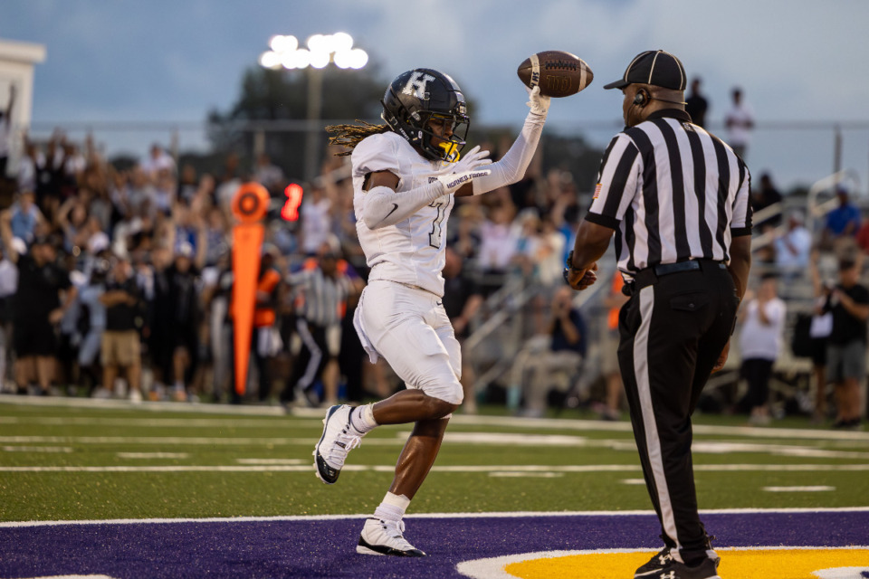 <strong>Houston High&rsquo;s Derrick Miller Jr. (7) scores a touchdown during the Mustangs win Thursday, Aug. 24, over DeSoto Central High School in a game played in Southaven, Miss</strong>. (Wes Hale/Special to The Daily Memphian)