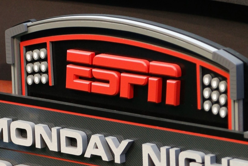 <strong>The ESPN logo is seen, Sept. 16, 2013, prior to an NFL football game between the Cincinnati Bengals and the Pittsburgh Steelers in Cincinnati.</strong> (David Kohl/AP Photo, File)