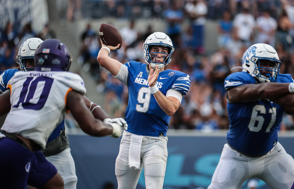 <strong>Memphis quarterback Seth Henigan (9) throws during an Aug. 31, 2024, game against North Alabama.</strong> (Patrick Lantrip/The Daily Memphian)