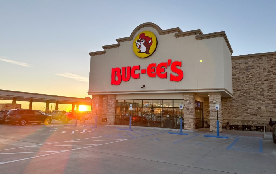 <strong>The sun rises beyond the 120 gasoline pumps outside a Buc-ee's store early April 4 in Johnstown, Colo.</strong> (David Zalubowski/AP file)