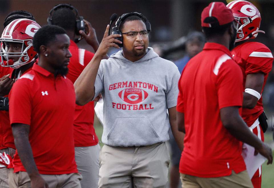 <strong>Germantown head coach Gene Robinson (middle) during action against Whitehaven on Friday, Sept. 3, 2021. Robinson took over the Red Devils&rsquo; program in 2020.</strong> (Mark Weber/The Daily Memphian file)&nbsp;