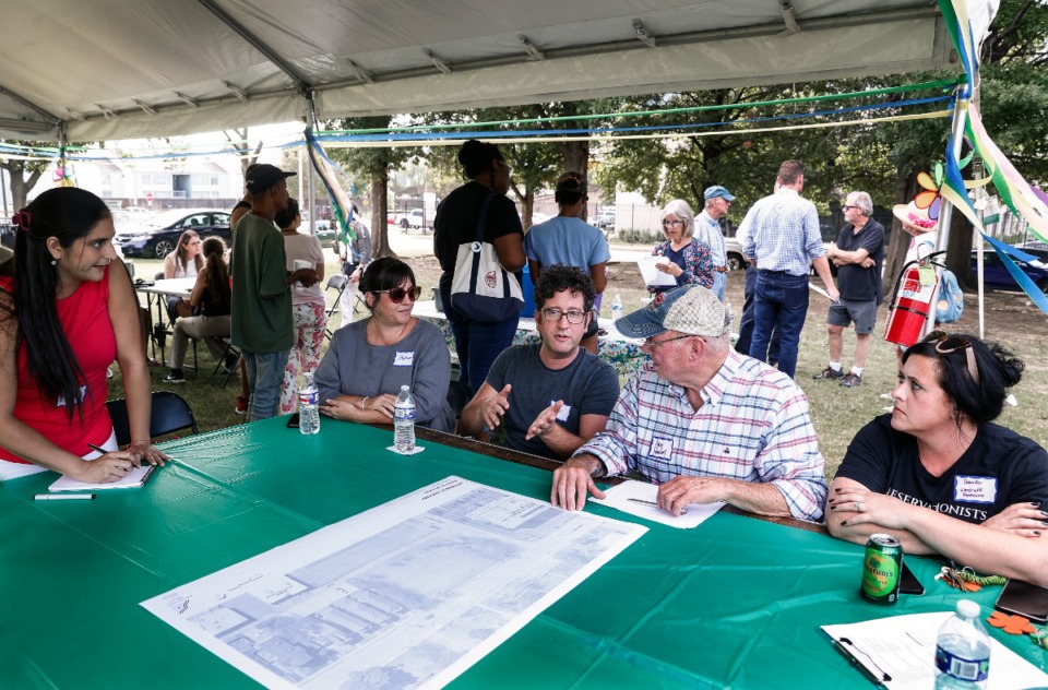 <strong>Community members attend a Reimagining Victorian Village Park event on Thursday, Sept. 5, 2024, in the park across Adams Street from the now-closed Juvenile Court.</strong>&nbsp;(Mark Weber/The Daily Memphian)