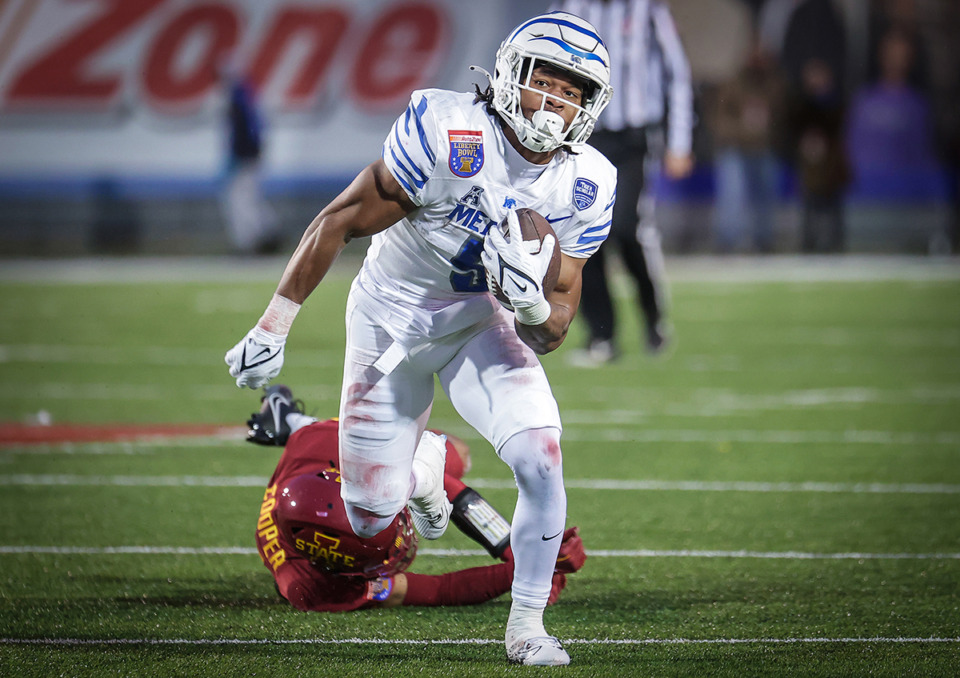 <strong>University of Memphis running back Sutton Smith (5) breaks a tackle during the AutoZone Liberty Bowl game against Iowa State Dec. 29, 2023.</strong> (Patrick Lantrip/The Daily Memphian file)