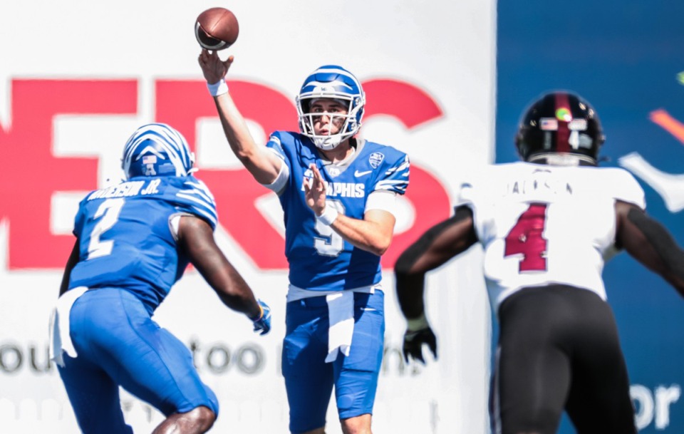 <strong>University of Memphis quarterback Seth Henigan (9) entered the game tied with former Tiger Danny Wimprine for the second-most passing touchdowns in school history.</strong>&nbsp;(Patrick Lantrip/The Daily Memphian)