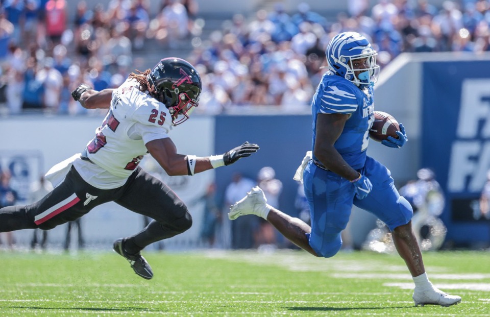 <strong>University of Memphis running back Mario Anderson (2) breaks a tackle on the way to a touchdown during a Sept. 7, 2024 game against Troy.</strong> (Patrick Lantrip/The Daily Memphian)