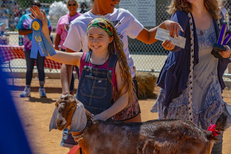 <strong>Ruby H. and goat Eeyore place first at the International Goat Days Festival in Millington on Saturday, Sept. 7, 2024.</strong> (Ziggy Mack/Special to The Daily Memphian)