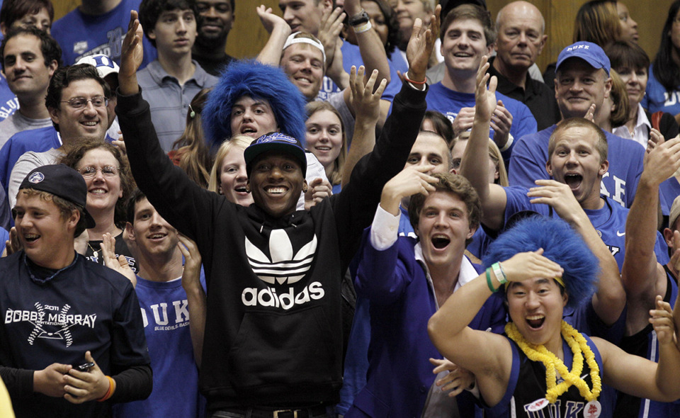 <strong>Portland Trail Blazer and former Duke player Nolan Smith sits with Duke fans during the second half of Duke's exhibition college basketball game against Shaw in Durham, N.C., Wednesday, Nov. 2, 2011.</strong> (Gerry Broome/AP Photo file)