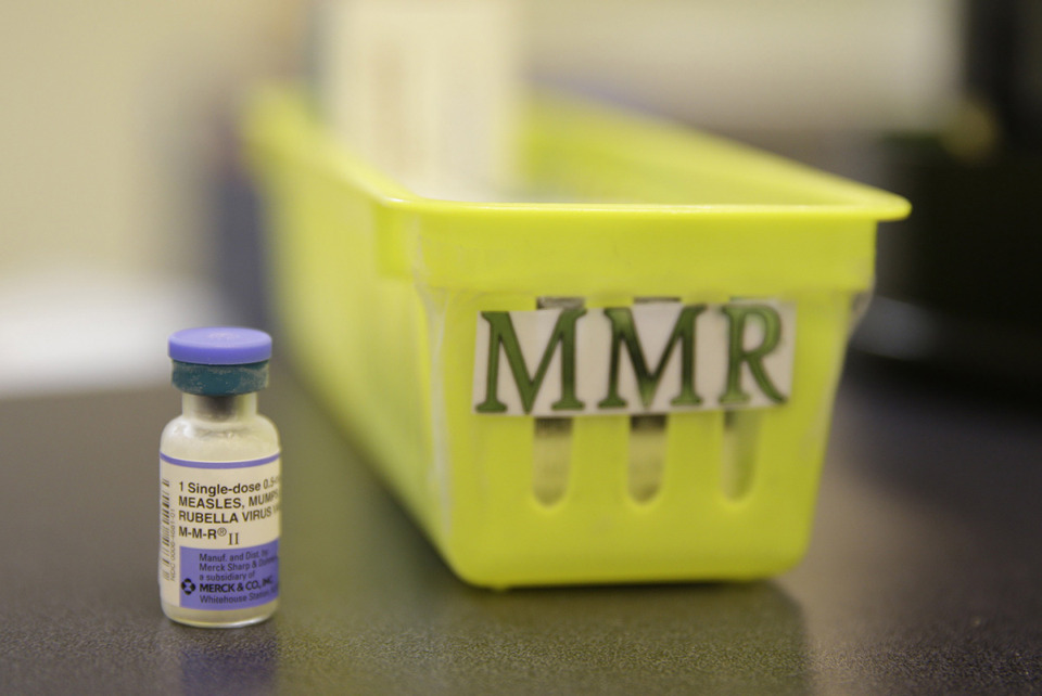 <strong>Measles symptoms can include fever, headache, cough, congestion and red eyes. The illness is typically accompanied by a spotty rash that begins on the face and spreads over the body.</strong> (Eric Risberg/AP file)