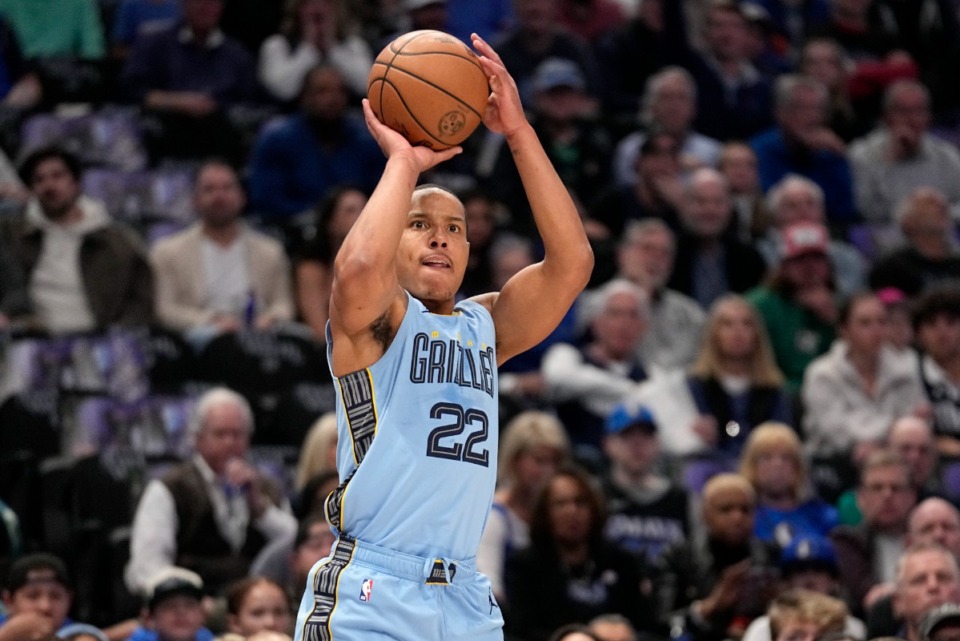 <strong>Memphis Grizzlies guard Desmond Bane (22) shoots and sinks a 3-point basket in the first half of an NBA basketball game against the Dallas Mavericks in Dallas, Friday, Dec. 1, 2023.</strong> (Tony Gutierrez/AP Photo)