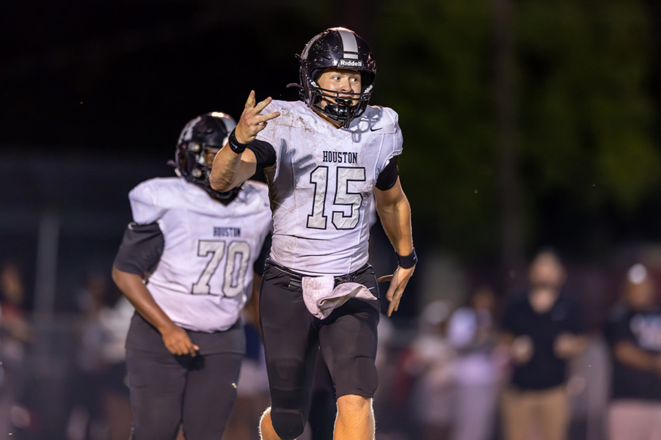 <strong>Chandler Day of the Houston Mustangs celebrates after scoring a touchdown during the game between Germantown High and Houston High in Germantown Sept. 6.</strong> (Wes Hale/Special to The Daily Memphian)