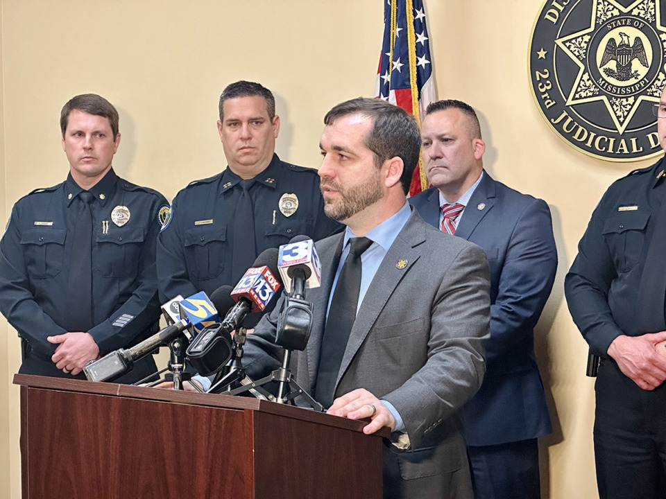 <strong>DeSoto County District Attorney Matthew Barton announced on Wednesday, Sept. 11 the indictment of former alderman Charlie Roberts for accepting unemployment payments. Barton is shown here (at microphone) at a press conference in April 2024.</strong> (Courtesy DeSoto County District Attorney&rsquo;s office)