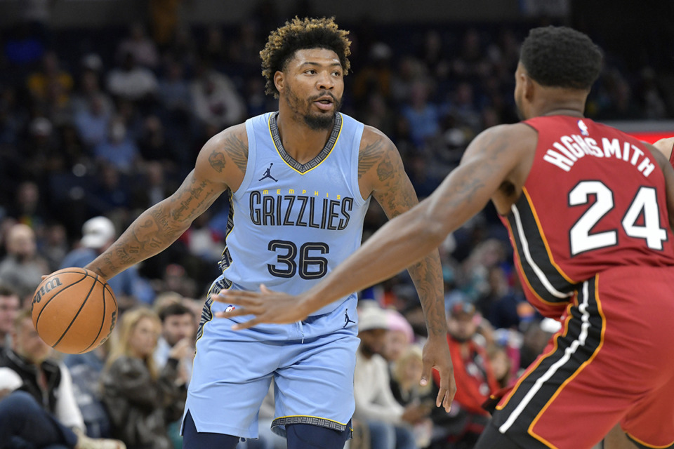 <strong>Memphis Grizzlies guard Marcus Smart (36) handles the ball against Miami Heat forward Haywood Highsmith (24) in the first half of an NBA basketball game, Wednesday, Nov. 8, 2023, in Memphis.</strong> (Brandon Dill/AP Photo)