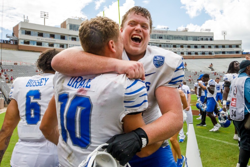 <strong>Memphis wide receiver Koby Drake (10) and offensive lineman Jonah Gambill (65) celebrate after defeating Florida State 20-12 in a NCAA college football game, Saturday, Sept. 14, 2024, in Tallahassee, Fla.</strong> (Colin Hackley/AP)