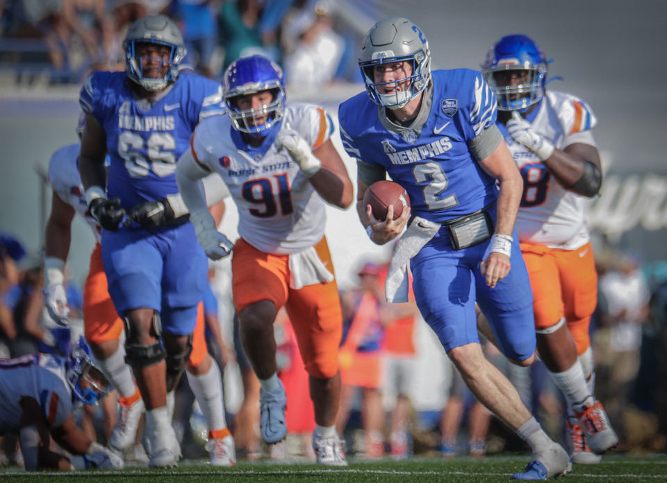 <strong>University of Memphis quarterback Seth Henigan (2) rushes for a first down during a Sept. 30, 2023, game against Boise State. Should the Tigers want to join the Broncos in the Pac-12?</strong> (Patrick Lantrip/The Daily Memphian file)