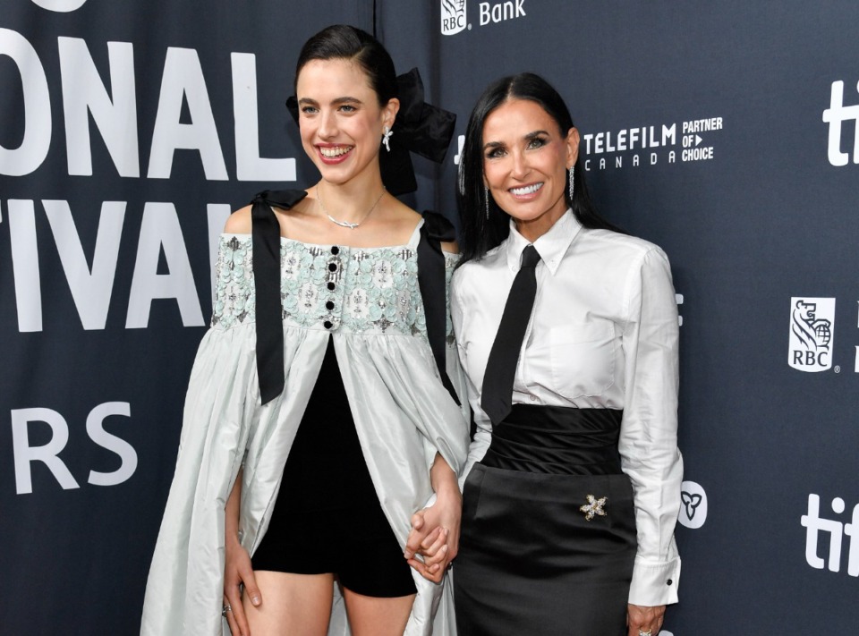 <strong>Margaret Qualley, left, and Demi Moore, stars of "The Substance," attend the premiere at the Royal Alexandra Theatre during the Toronto International Film Festival on Thursday, Sept. 5, 2024, in Toronto.</strong> (Evan Agostini/Invision/AP)