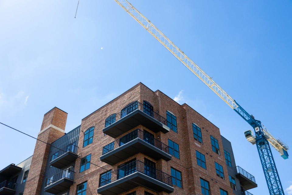 <strong>The Oliver apartment building is shown while it is still under construction in May 2024. The tower to the left pays homage to the Nylon Net building, which used to stand in the same location, by representing its' smoke stack.</strong> (Benjamin Naylor/The Daily Memphian)