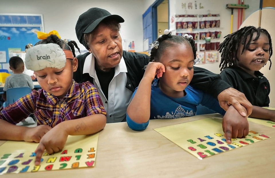 <strong>Alice Holman (in a file photo) helped pupils read aloud in a small group during pre-k at Porter-Leath's Douglas Head Start School on April 23, 2019.&nbsp;</strong> (Jim Weber/Daily Memphian)