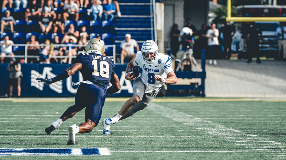 <strong>Memphis quarterback Seth Henigan runs with the ball as the Tigers play the Navy Midshipmen, Saturday, Sept. 21, 2024, in Annapolis, Md.</strong> (Courtesy Memphis Athletics)