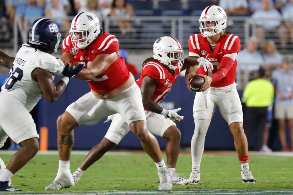 <strong>Mississippi quarterback Jaxson Dart, right, hands the ball to running back Matt Jones (0) during the first half of an NCAA college football game against Georgia Southern, Saturday, Sept. 21, 2024, in Oxford, Miss.</strong> (Sarah Warnock/AP)