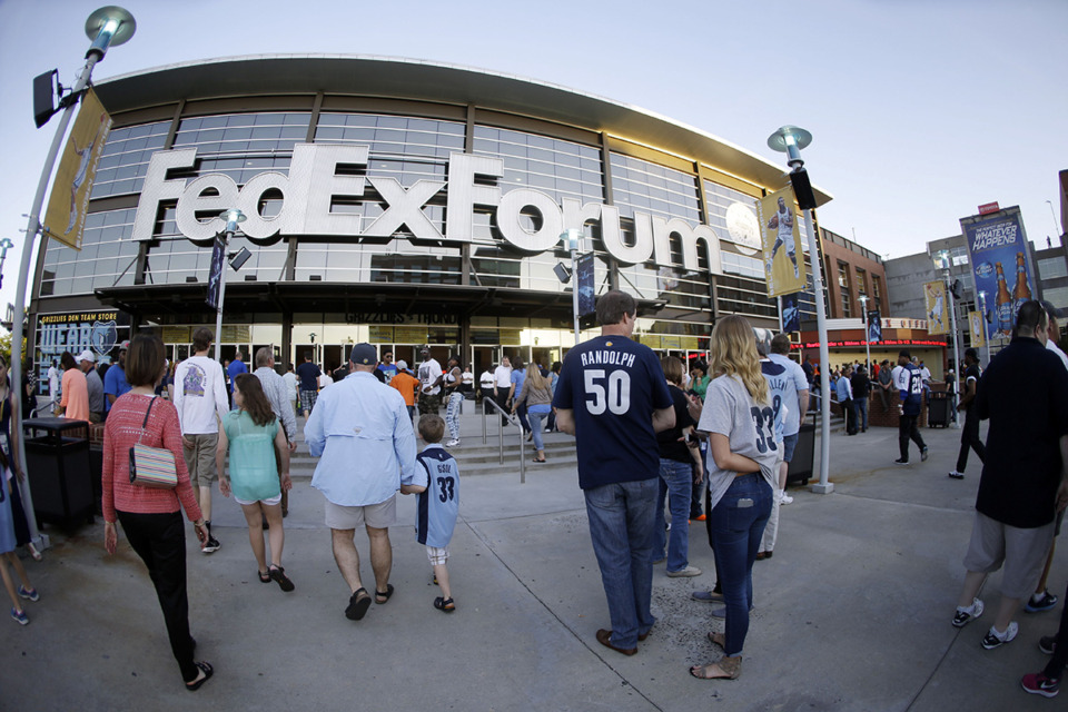 <strong>Fans arrive at FedExForum for Game 4 of an opening-round NBA basketball playoff series between the Memphis Grizzlies and the Oklahoma City Thunder on Saturday, April 26, 2014, in Memphis. Will the future of the NBA team be a casualty of the gun referendum fight?</strong> (Mark Humphrey/AP Photo file)