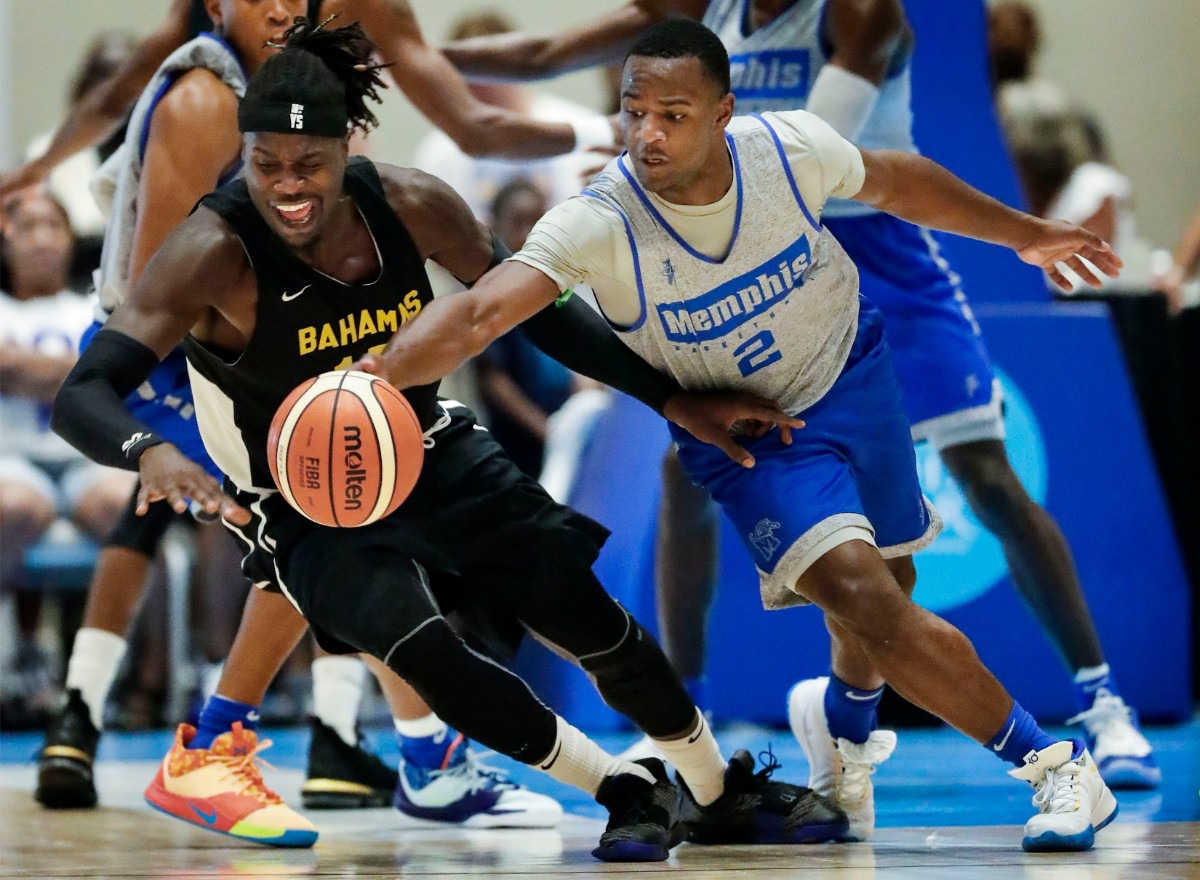 <strong>Memphis Tigers defender Alex Lomax (right) strips the ball away from Bahamas National Team forward Mark St. Fort (left) during action in their exhibition game in Nassau, Bahamas, Saturday, August 17, 2019.</strong> (Mark Weber/Daily Memphian)