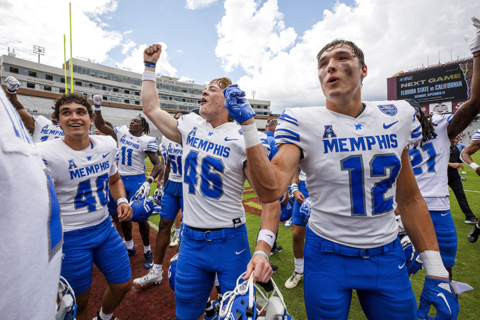 <strong>Memphis long snapper Jonathan Zarut (40), punter Tanner Gillis (46) and wide receiver Brady Kluse (12) celebrate defeating Florida State 20-12 in a NCAA college football game, Saturday, Sept. 14, 2024, in Tallahassee, Fla.</strong> (Colin Hackley/AP Photo file)