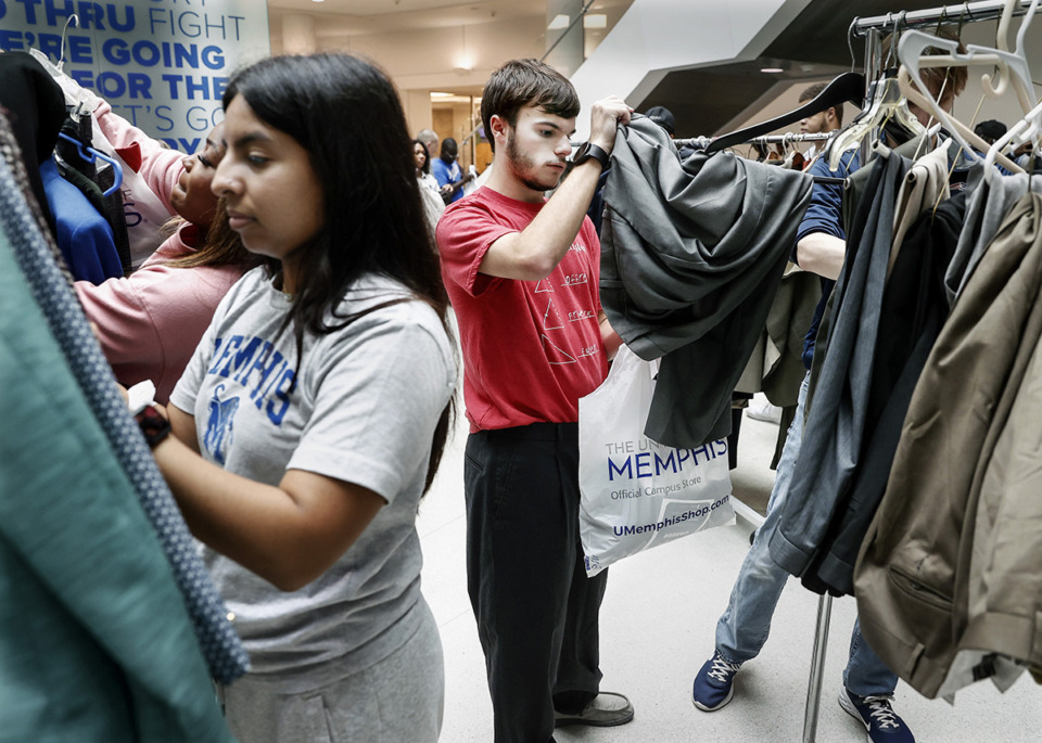 <strong>University of Memphis students peruse racks of donated work clothes during the school&rsquo;s Career Closet event Sept. 24.</strong> (Mark Weber/The Daily Memphian)